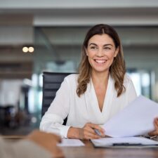 HR leader reviewing her team’s performance | How to improve employee engagement