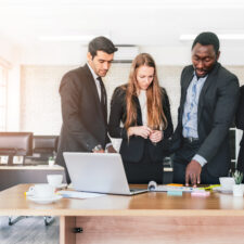 Employees collaborating on a project | What is internal communication?