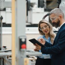 HR leader collaborating with a frontline employee | Reduce employee turnover