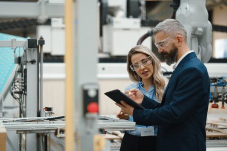 HR leader collaborating with a frontline employee | Reduce employee turnover