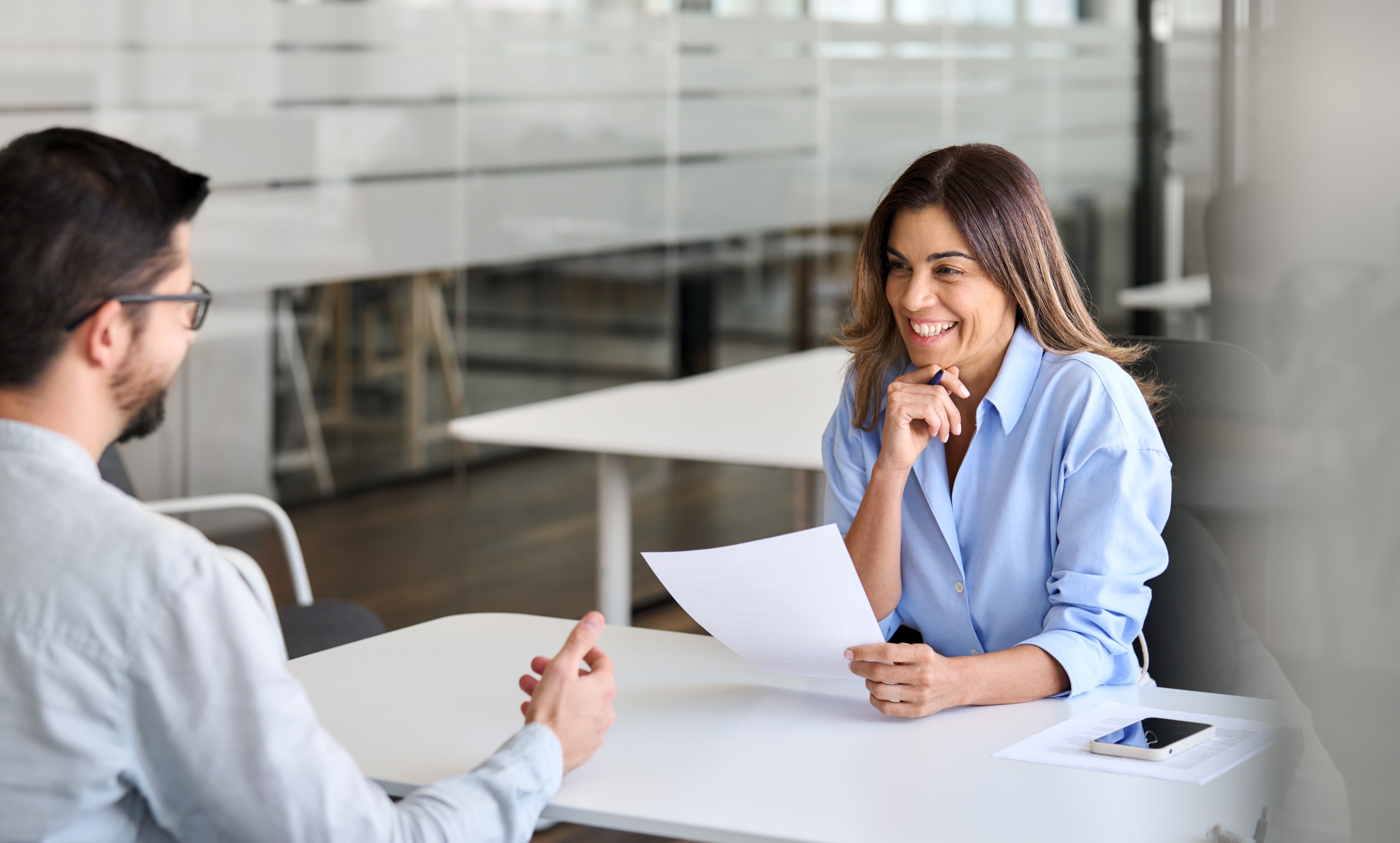 IT leaders reviewing an implementation plan | Advantages and disadvantages of intranets